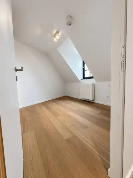 Stijlvol dakappartement met terras en veel privacy in het centrum van Geel foto 12