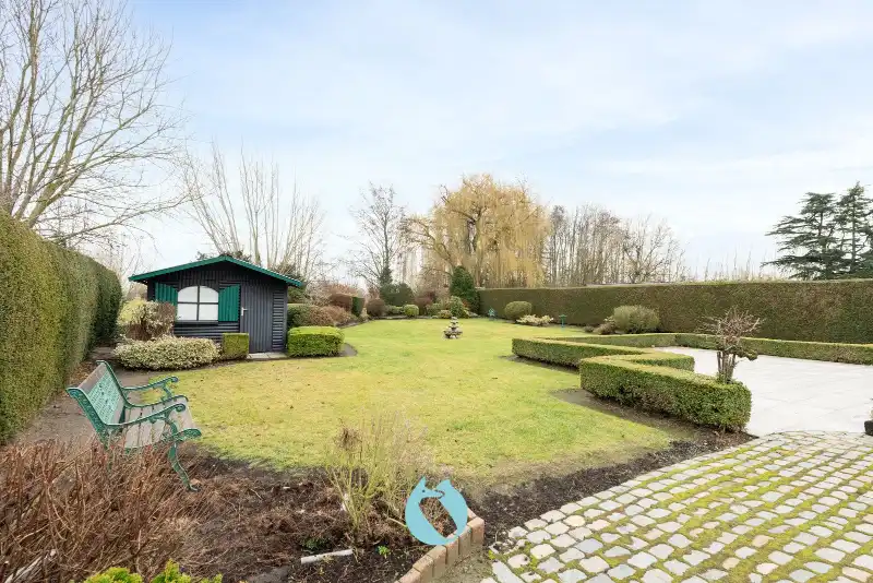 Charmante woning met riante tuin op een perceel van 1.061 m² in een rustige verkaveling te Evergem. foto 18