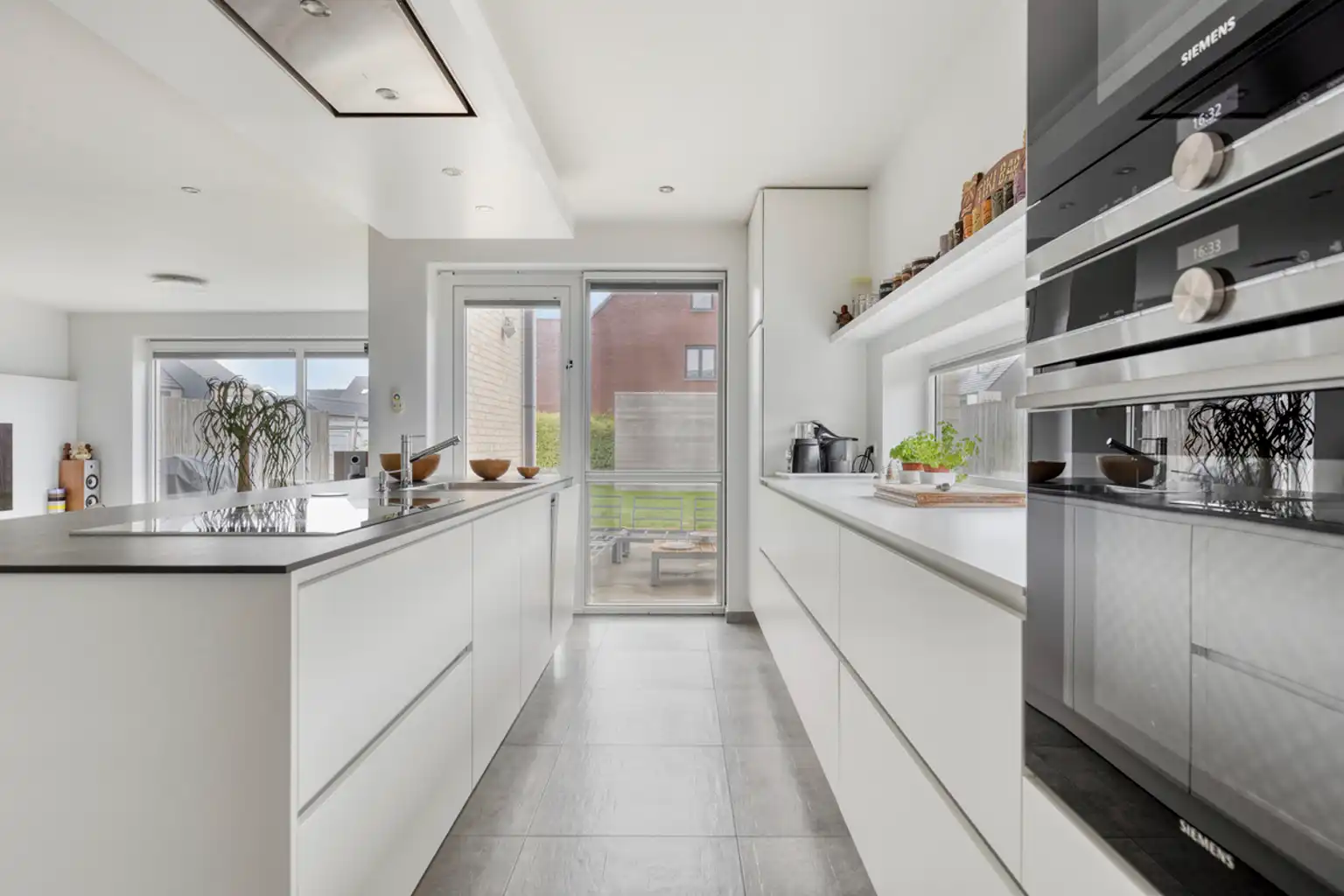 Instapklare halfopen bebouwing met 2 slaapkamers en tuin foto 10