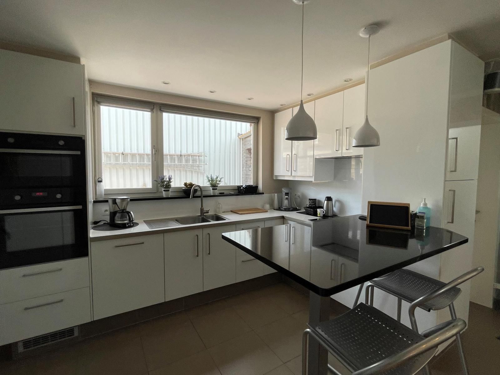 Instapklare woning met oprit, garage en zuidgerichte tuin foto 6