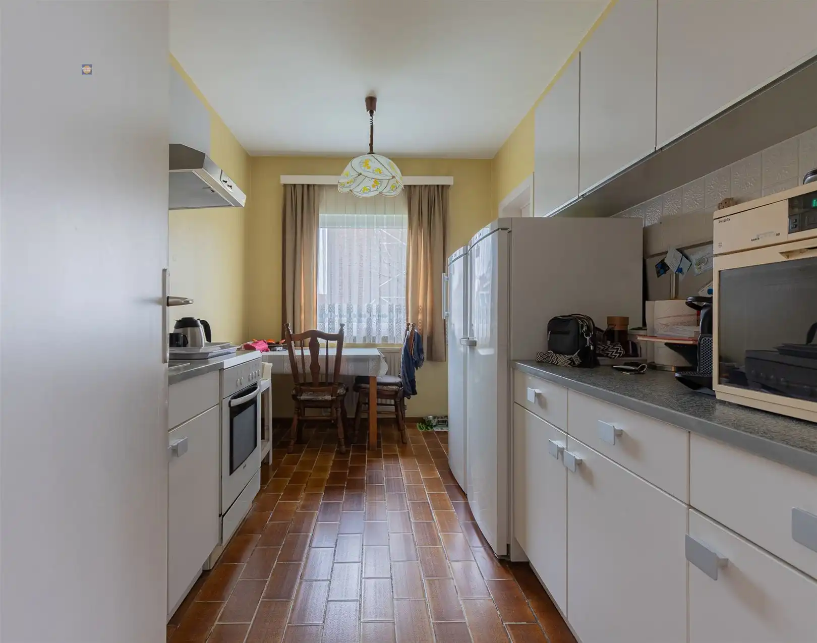 Gelijkvloers 2-slaapkamerappartement met tuin en garage foto 5