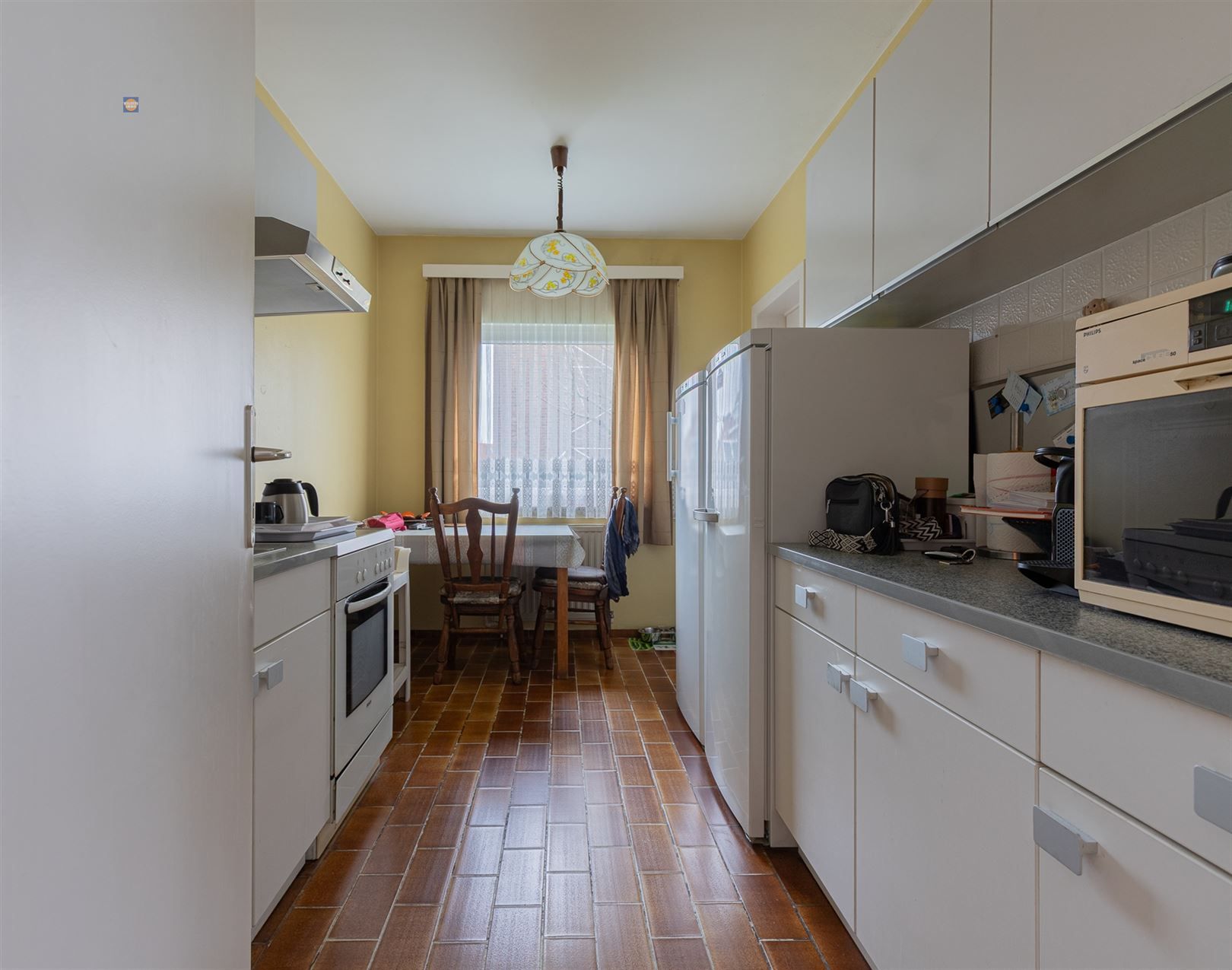 Gelijkvloers 2-slaapkamerappartement met tuin en garage foto 5