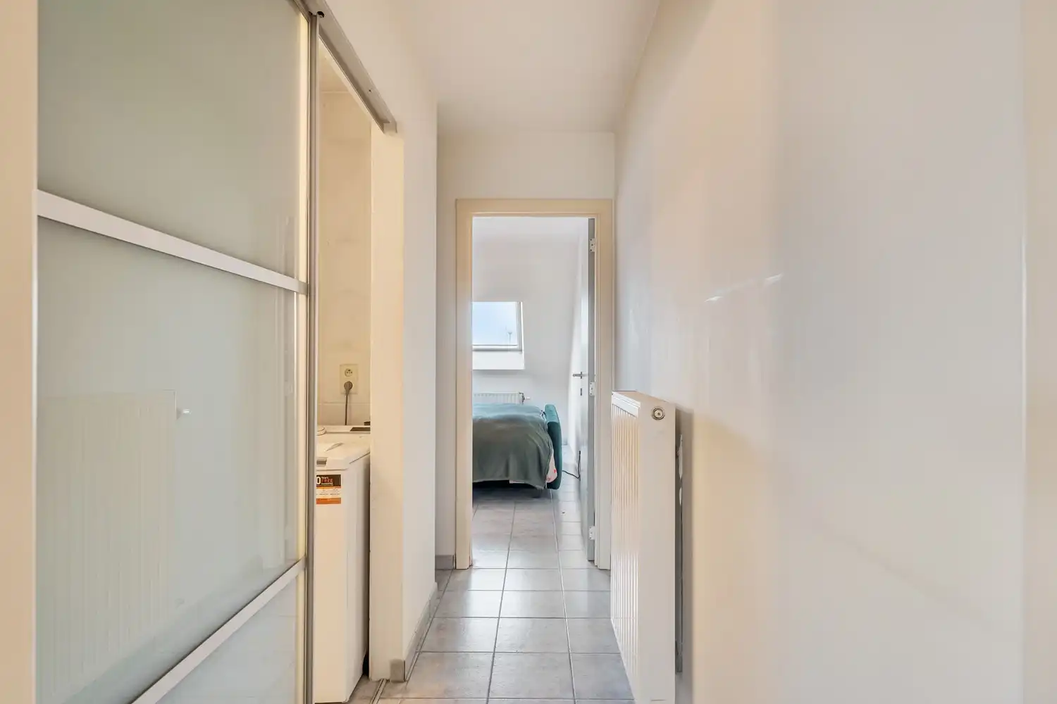 Ruim en energiezuinig appartement met 2 slaapkamers, een ruim terras en een autostaanplaats aan de rand van Leuven! foto 14