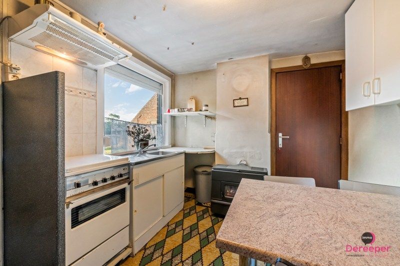 Alleenstaande woning met bijgebouwen en prachtig landelijk uitzicht foto 9