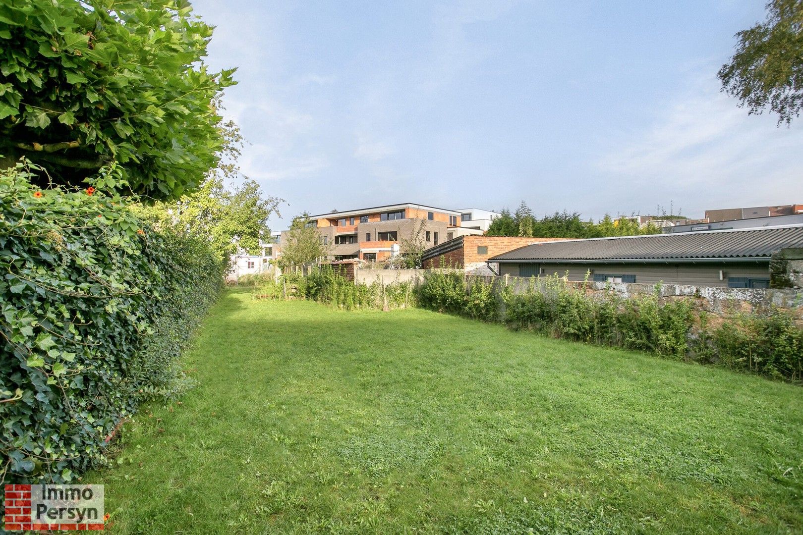 Gelijkvloers appartement met tuin, parkeerplaats en polyvalente ruimte foto 19