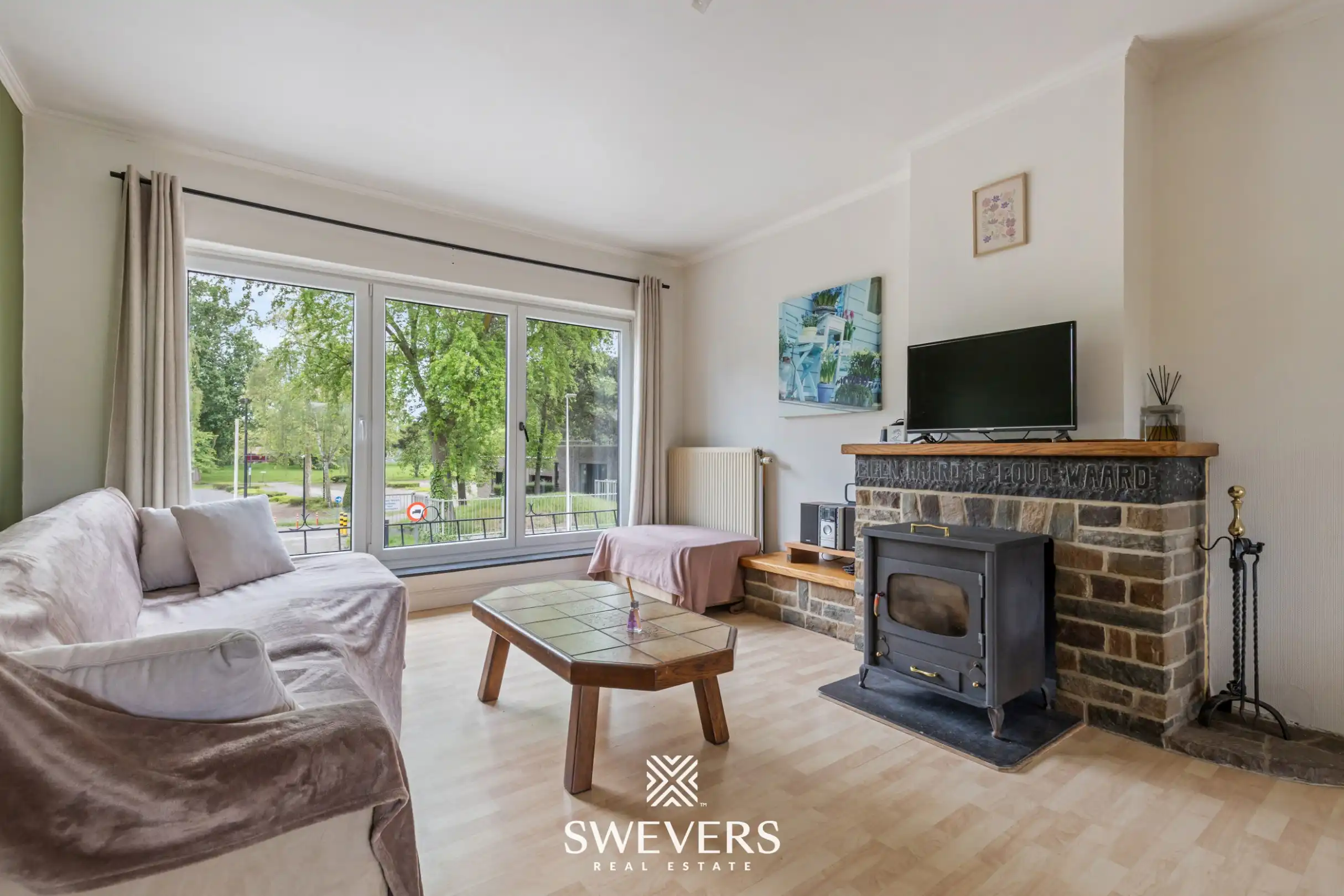 Instapklare rijwoning met 2 zeer ruime slaapkamers en uitstekende ligging foto 5
