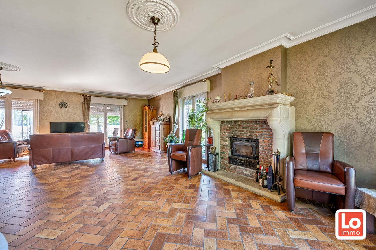 Ruime te renoveren open villa met inpandige garage op een héél rustige toplocatie met open zicht in Lochristi! foto 9