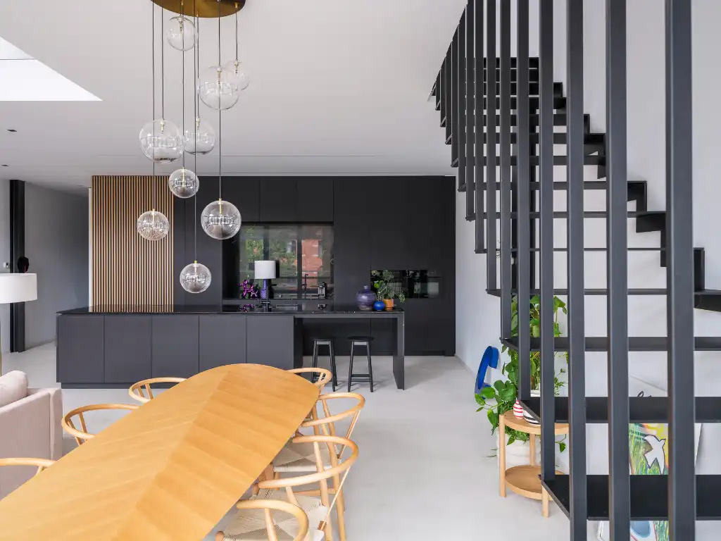 Luxueus en tijdloos – Exceptionele loft met 2 slaapkamers, aparte bureauruimte en ruim terras in een beschermd gebouw met een rijke industriële voorgeschiedenis. foto 11