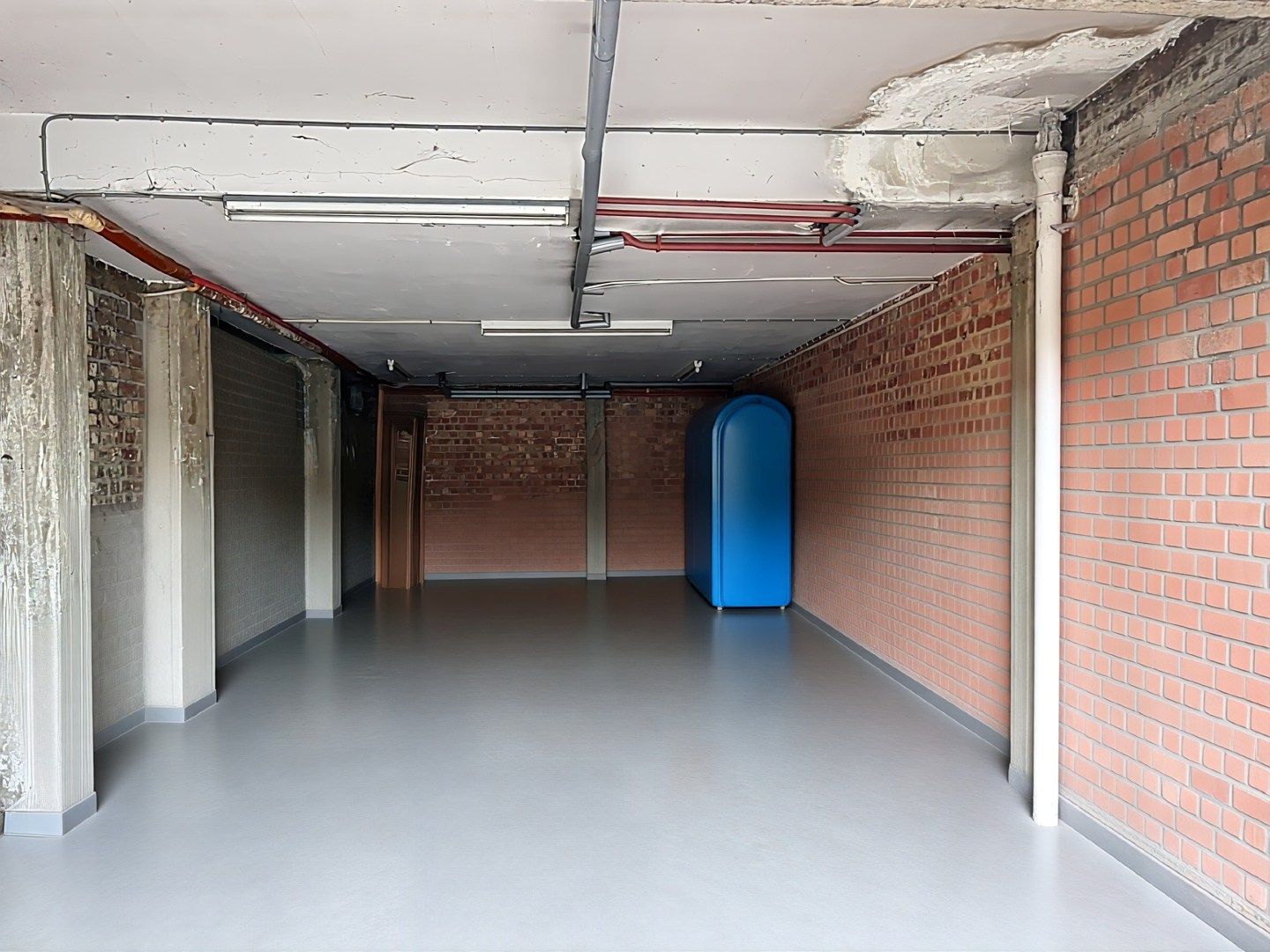 Veelzijdig pand op topligging: wonen en werken of tweewoonst met terrassen en garage foto 21