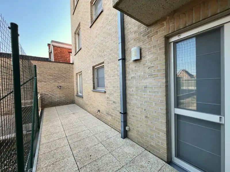 Vernieuwd 2-slaapkamer appartement, met staanplaats en kelderberging foto 16
