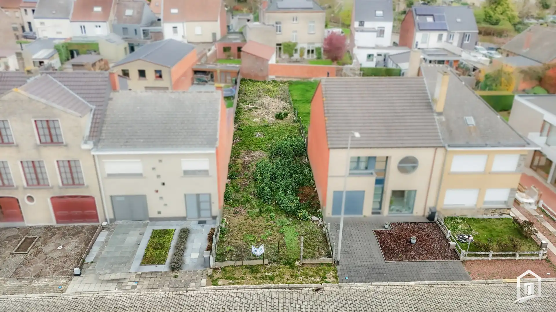 Perceel grond te koop te Denderleeuw voor gesloten bebouwing foto 2