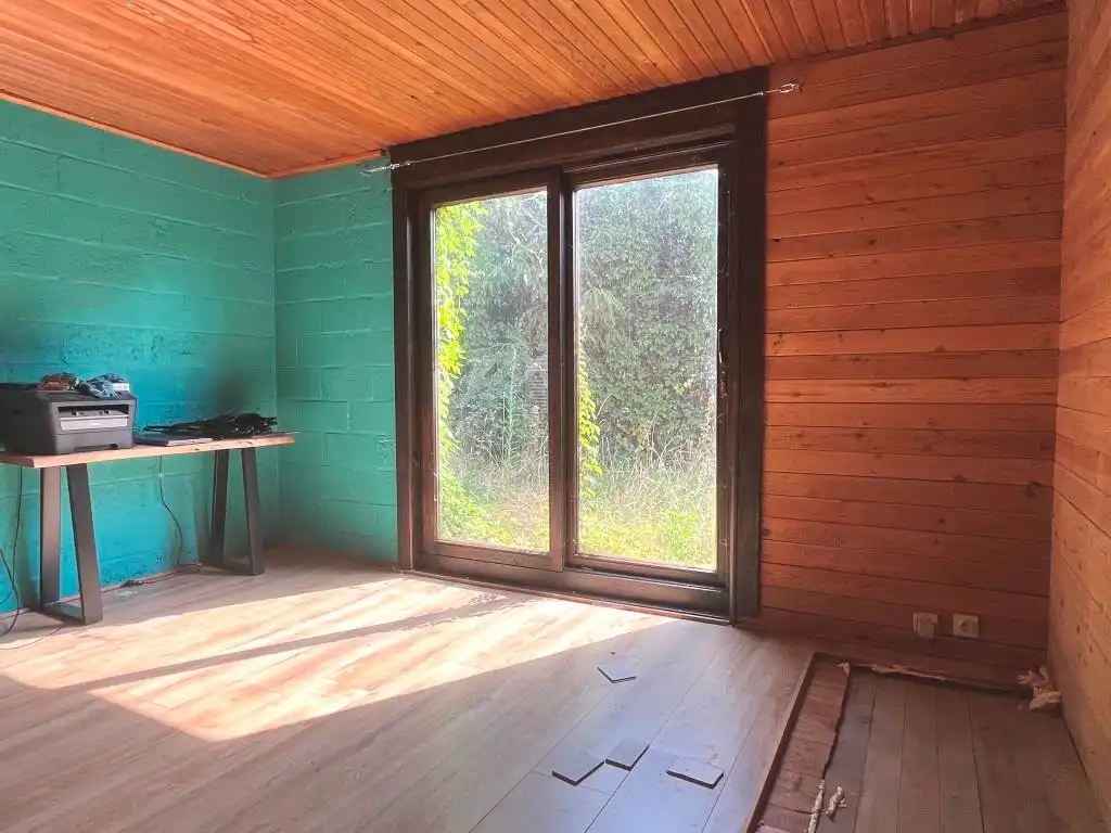 Volledig te verbouwen/slopen woning (bouwgrond) met 3 slaapkamers, inpandige garage, tuin en garagebox op een perceel van 1.154m² foto 9