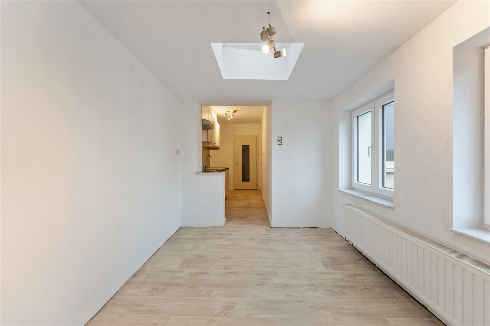 VERNIEUWD APPARTEMENT MET 2 SLAAPKAMERS PAL IN HET CENTRUM VAN BERINGEN foto 9