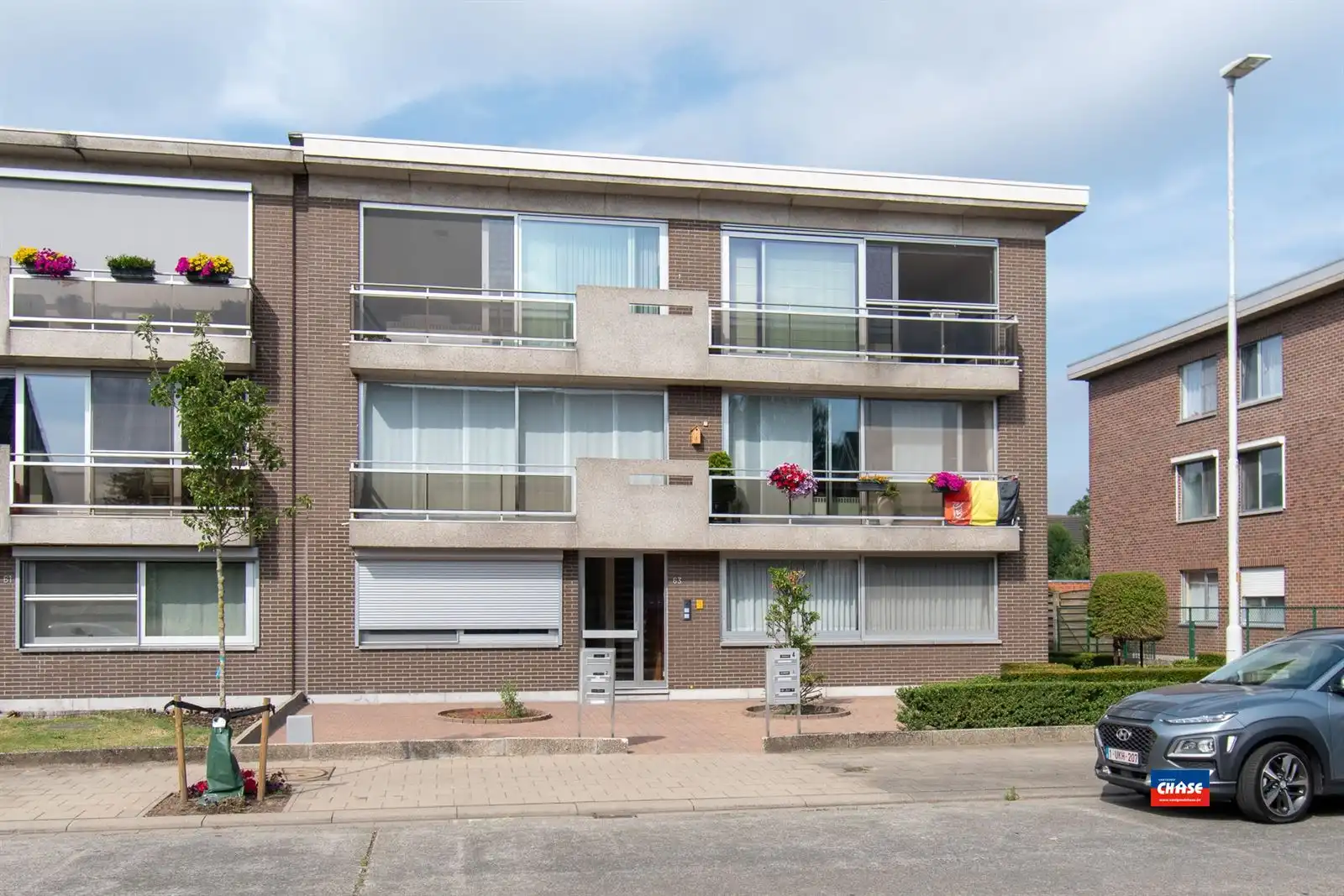 Gelijkvloersapp. met 2 slpks, tuin + garagebox foto {{pictureIndex}}