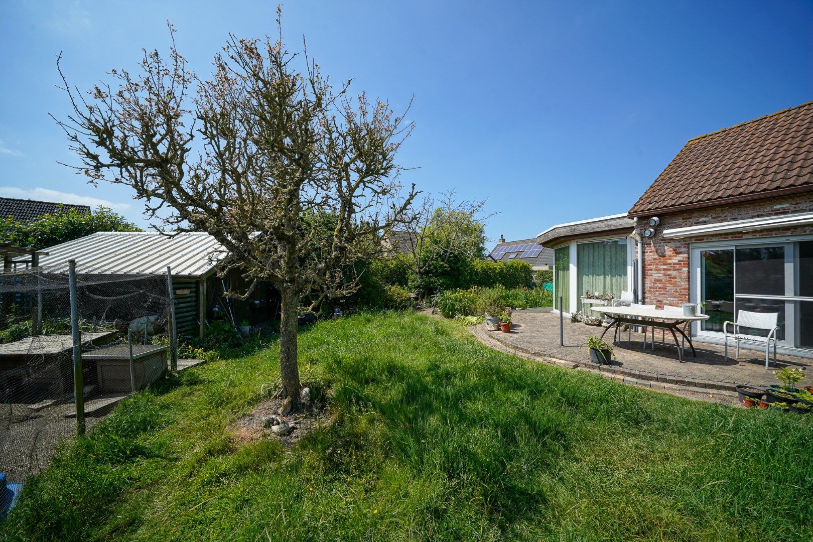 Ruime woning in Oudenburg met zongerichte tuin foto 11