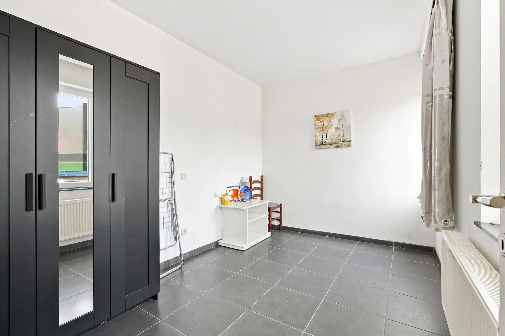 Ruime hoekwoning met 3 woonunits in het centrum van De Panne.  foto 12