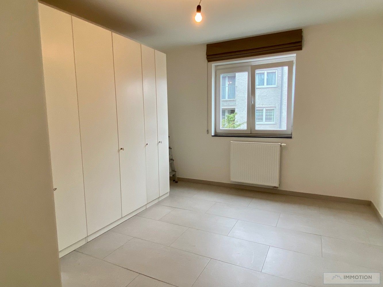 Groot appartement in centrum Kuurne met zuidelijk terras en parkeerplaats foto 10