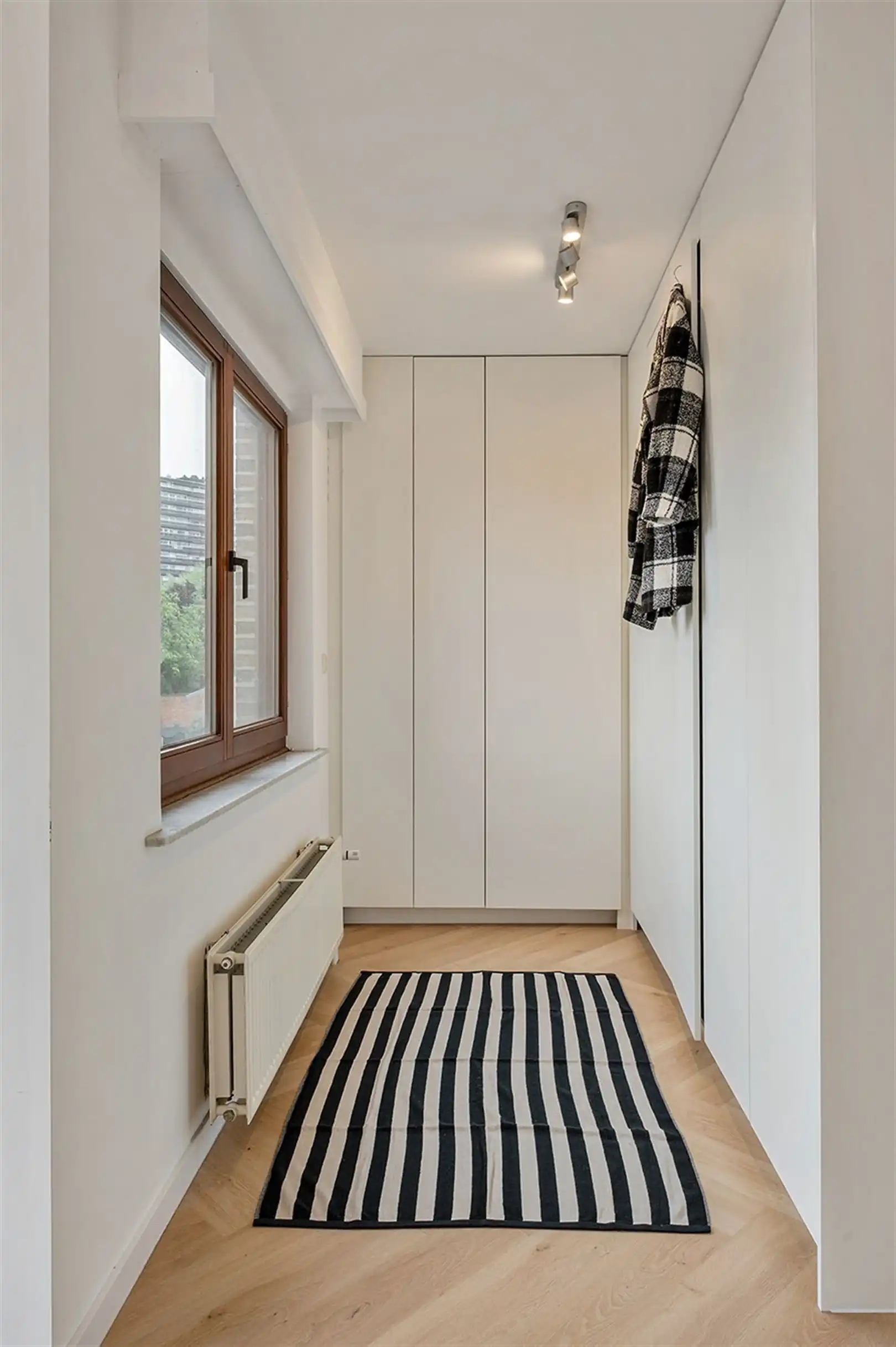 Instapklaar appartement met 2 grote slaapkamers, terras en garagebox foto 15