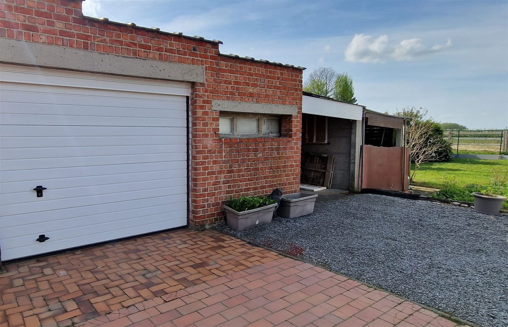 3-gevelwoning op 5 are 53 ca - 4 slpks - garages/autostaanplaatsen  - tuin foto 27