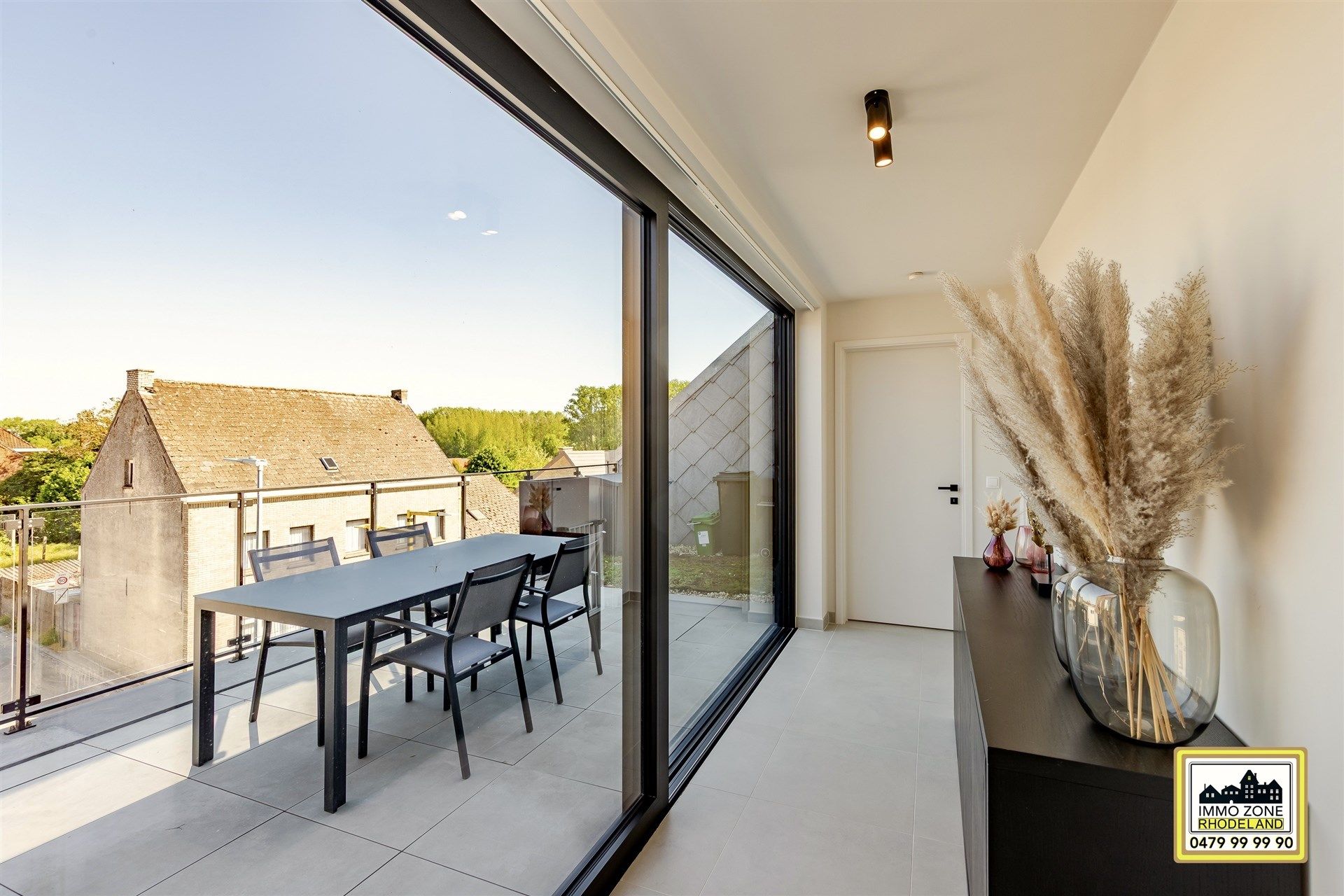 Lichtrijk appt met 2 slpks, 3 terrassen, garage, staanplaats foto 4