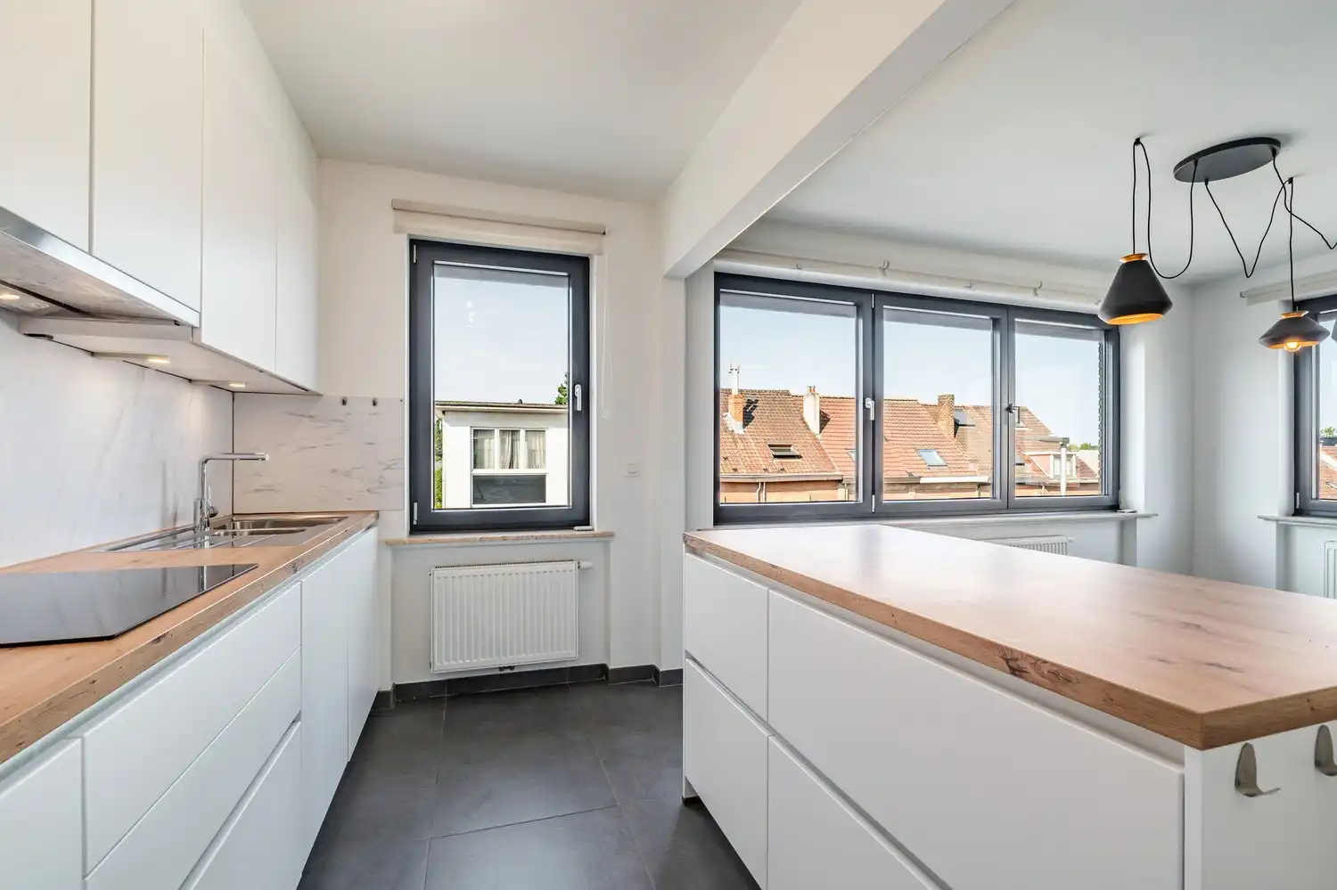 Volledig gerenoveerd 2-slaapkamerappartement met garage in Sint-Pieters-Leeuw foto 9