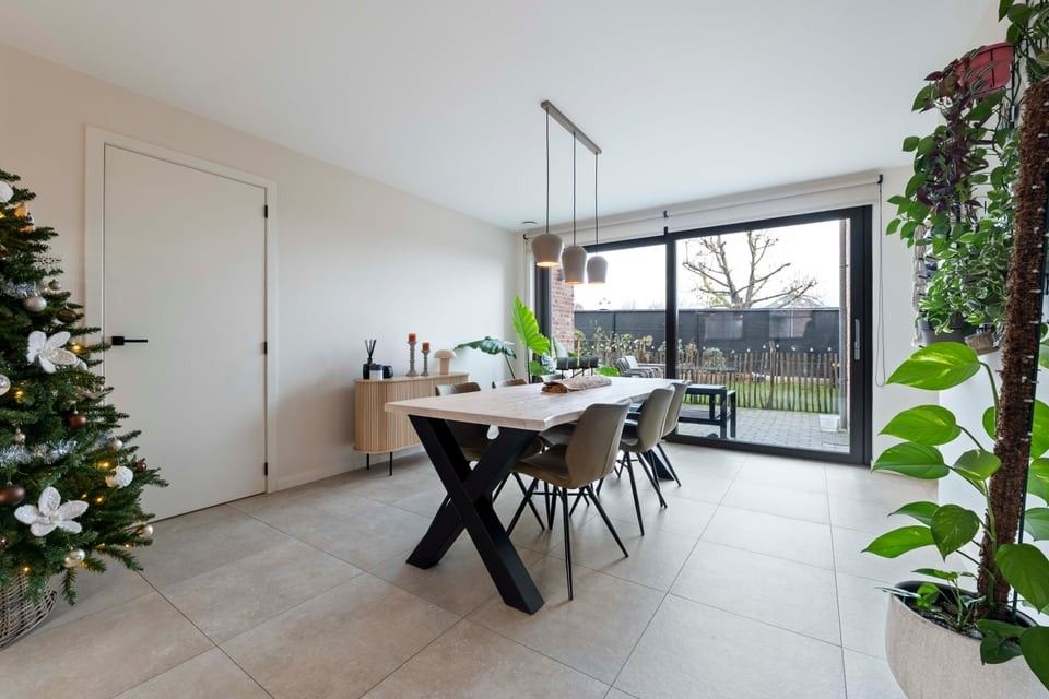 PRACHTIG NIEUWBOUWAPPARTEMENT MET 2 SLKS EN EEN STAANPLAATS IN HET LANDELIJKE HEERS foto 7