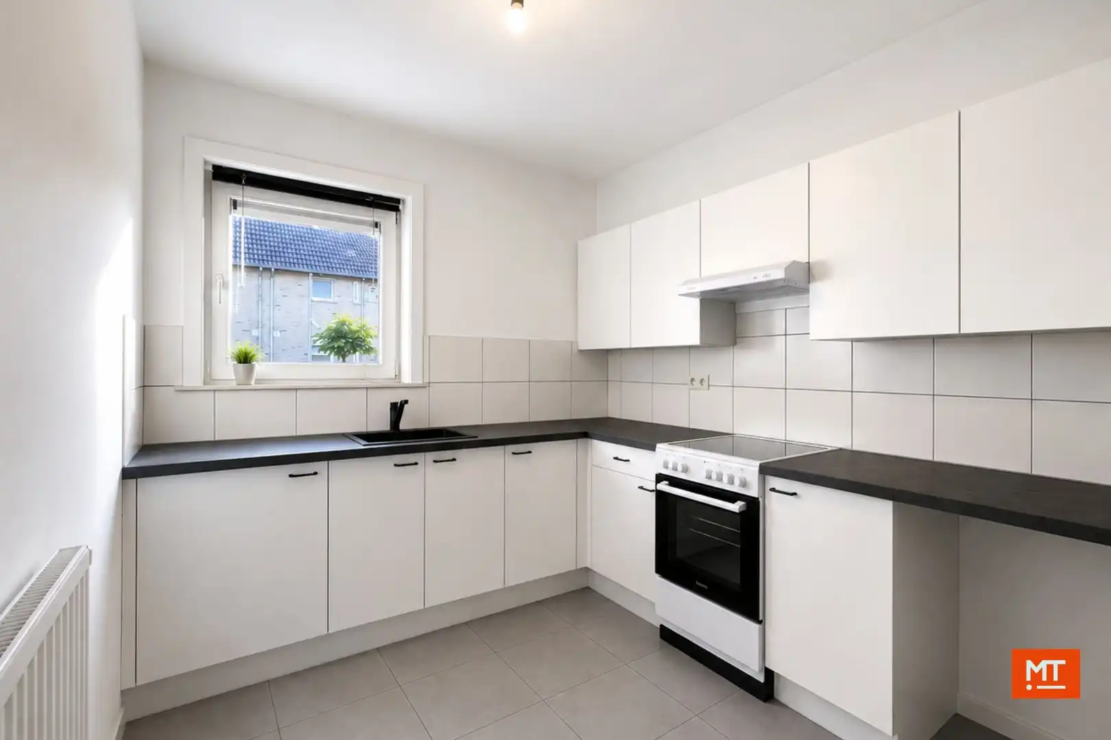 Woning te huur met 3 slaapkamers, tuin en garage te Heule foto 5