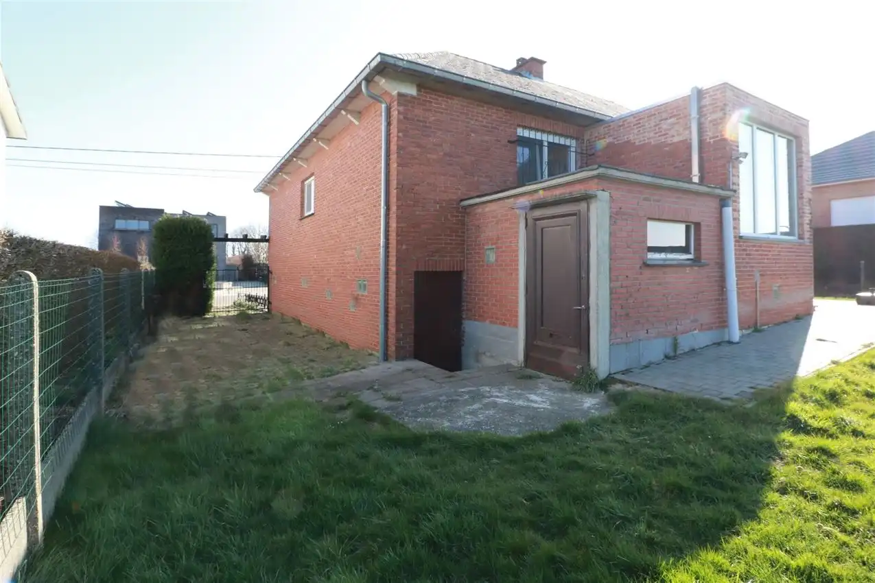 Gusting gelegen woning met 2 slpk, garage en tuin foto 32