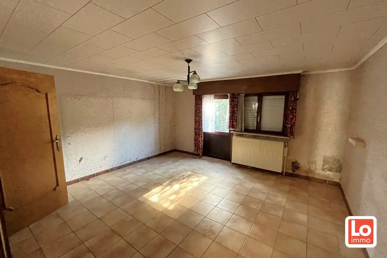 Te renoveren woning met 3 slaapkamers en tuin op een topligging in Centrum Lochristi foto 11