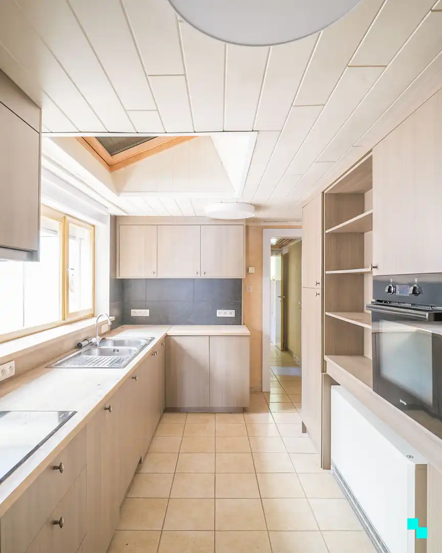 Te renoveren woning met gezellige tuin in het hart van Merelbeke foto 7