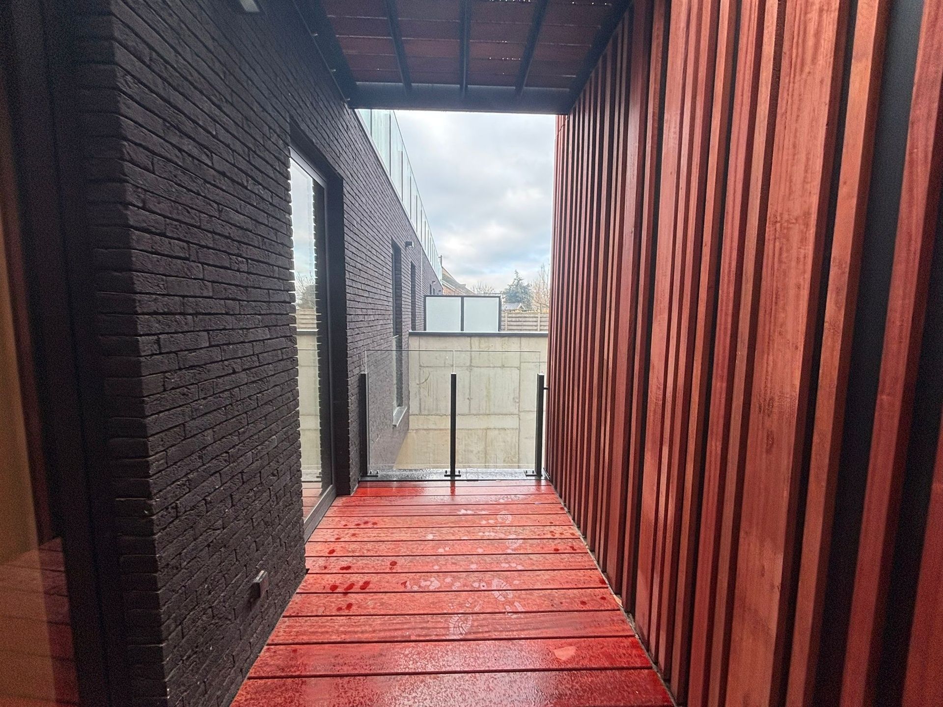 Modern gelijkvloers appartement met private tuin en ruime terrassen in Asse! foto 17
