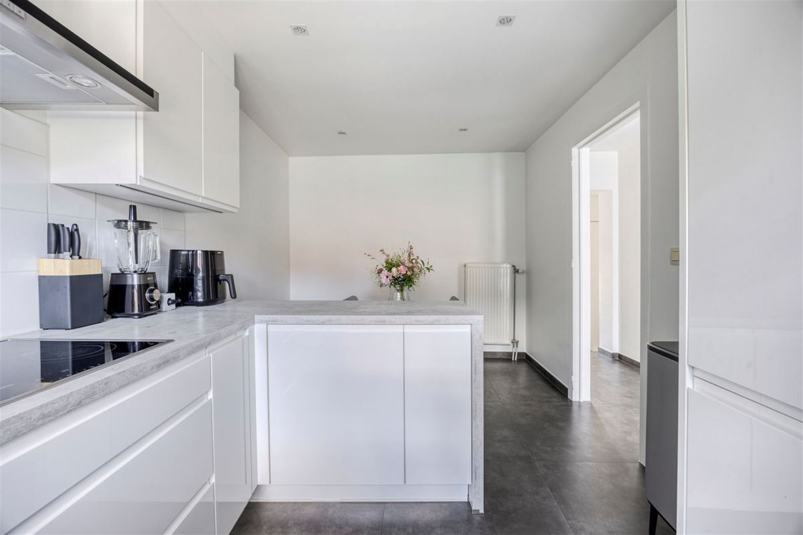 Instapklare, rustig achterin gelegen 3-gevelwoning nabij Hallerbos! foto 13