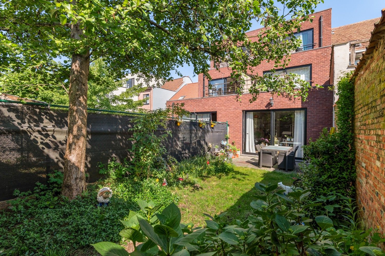 Instapklaar gelijkvloers 1-slaapkamer appartement met tuin te Deurne foto 11