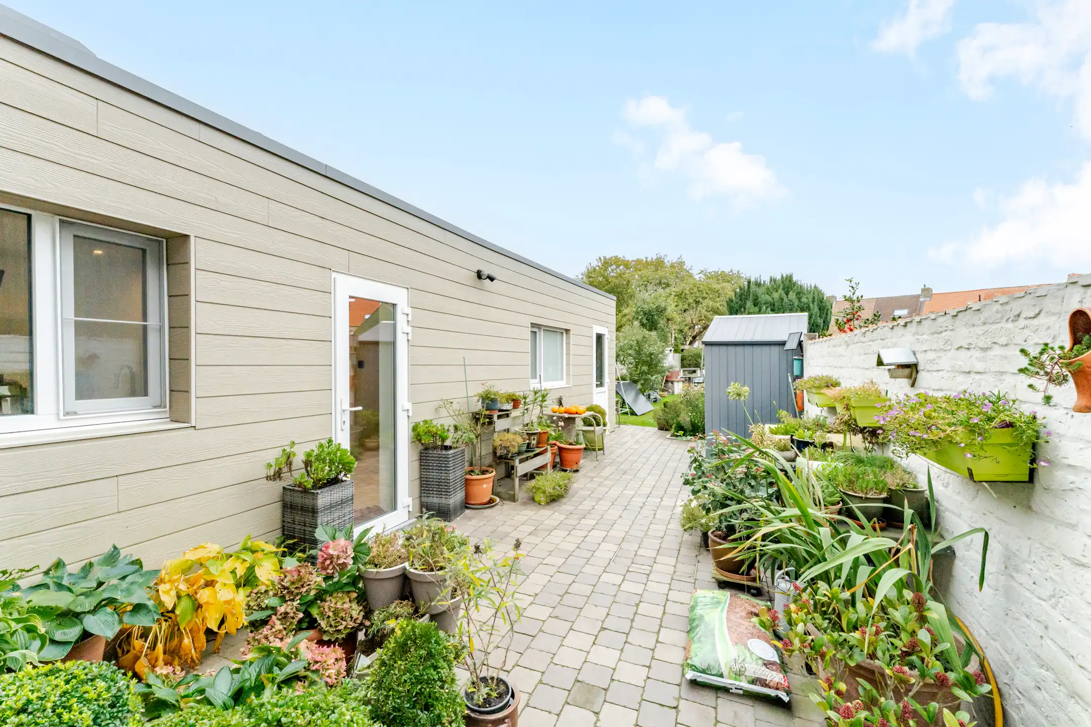 Halfopen bebouwing met 3 slpks en ruime tuin te Assebroek foto 22