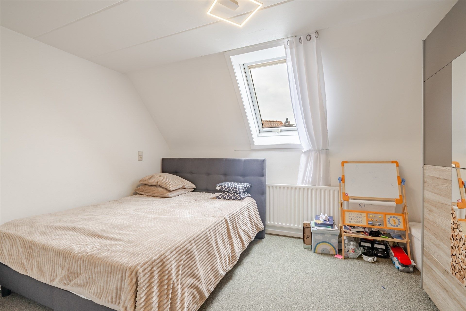 Opbrengsteigendom bestaande uit 7 appartementen + 1 kantoorruimte + 13 overdekte autostaanplaatsen foto 5