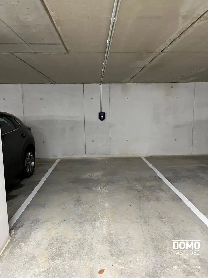 Penthouse met twee slaapkamers, ruim terras en autostandplaats te Kermt foto 14