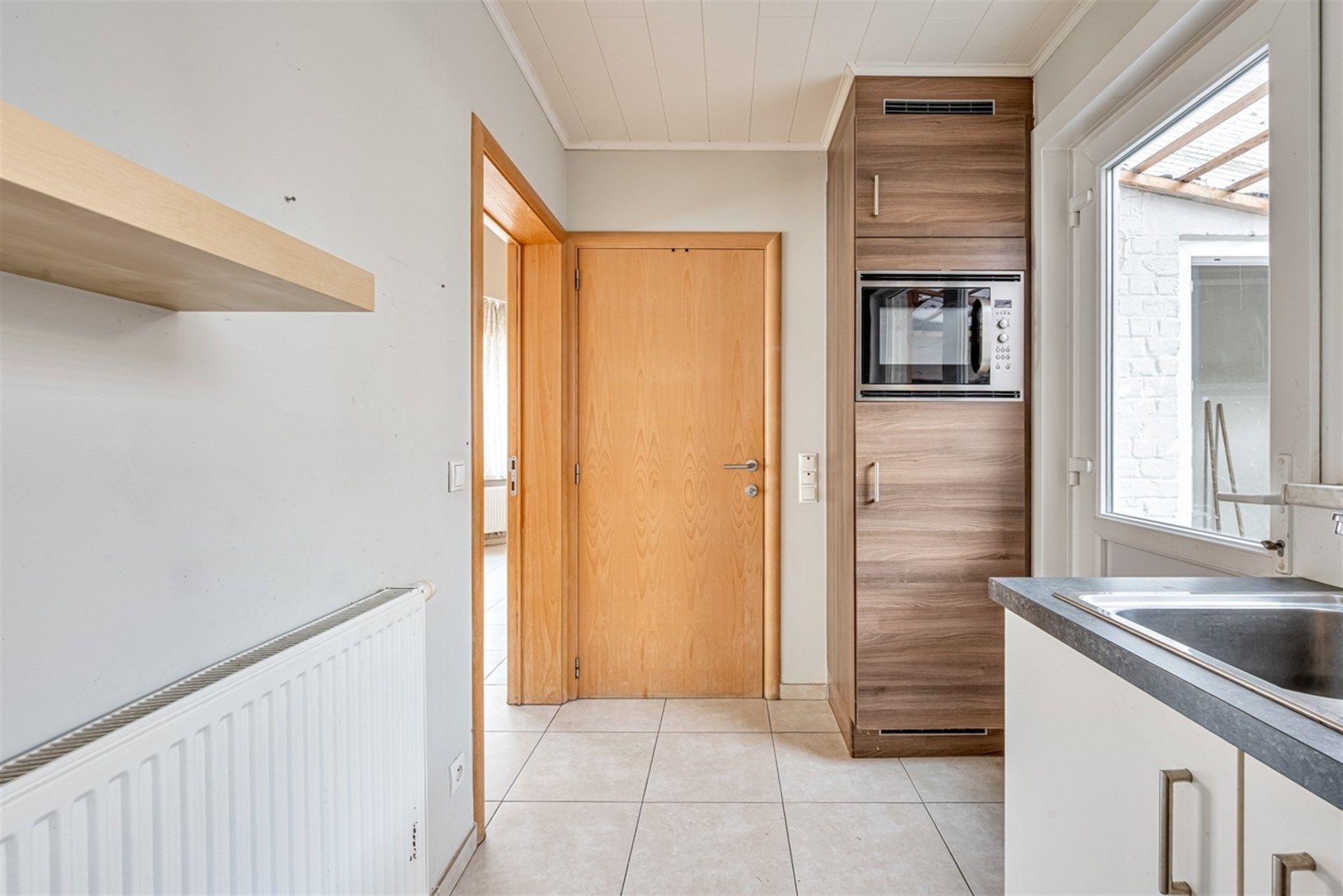 Instapklare woning met drie slaapkamers en koer te Hofstade foto 8