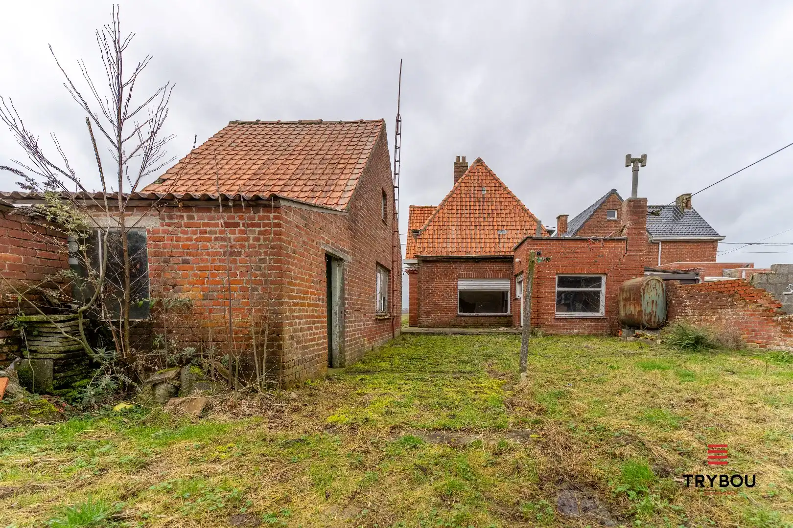 Te renoveren woning met bijgebouw en tuin in Houthulst foto 4