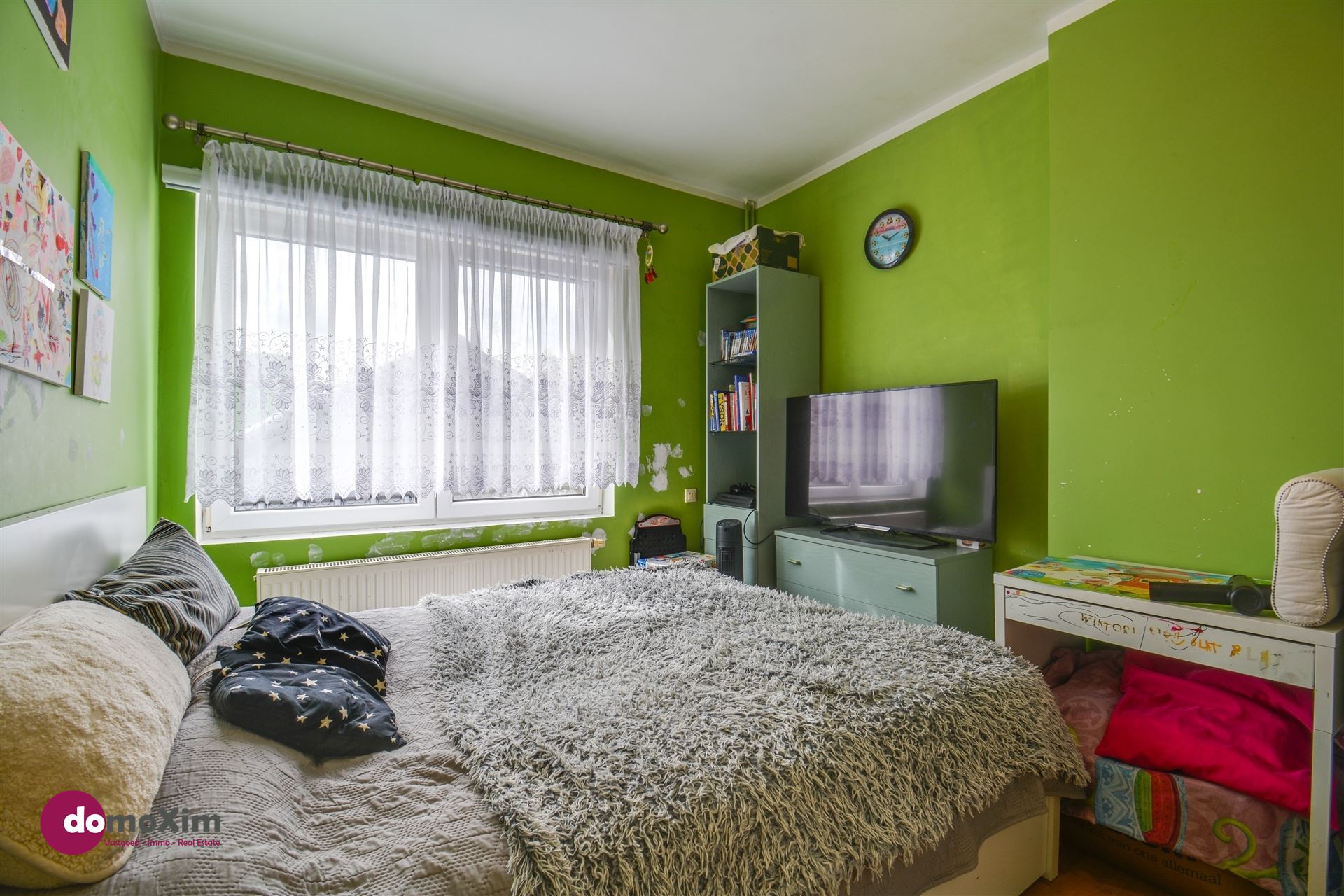 Centraal gelegen woning met 4 slaapkamers en grote tuin foto 8