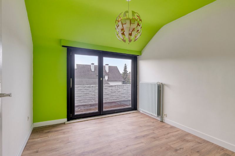 Ruime gezinswoning met tuin en zicht op groen foto 11