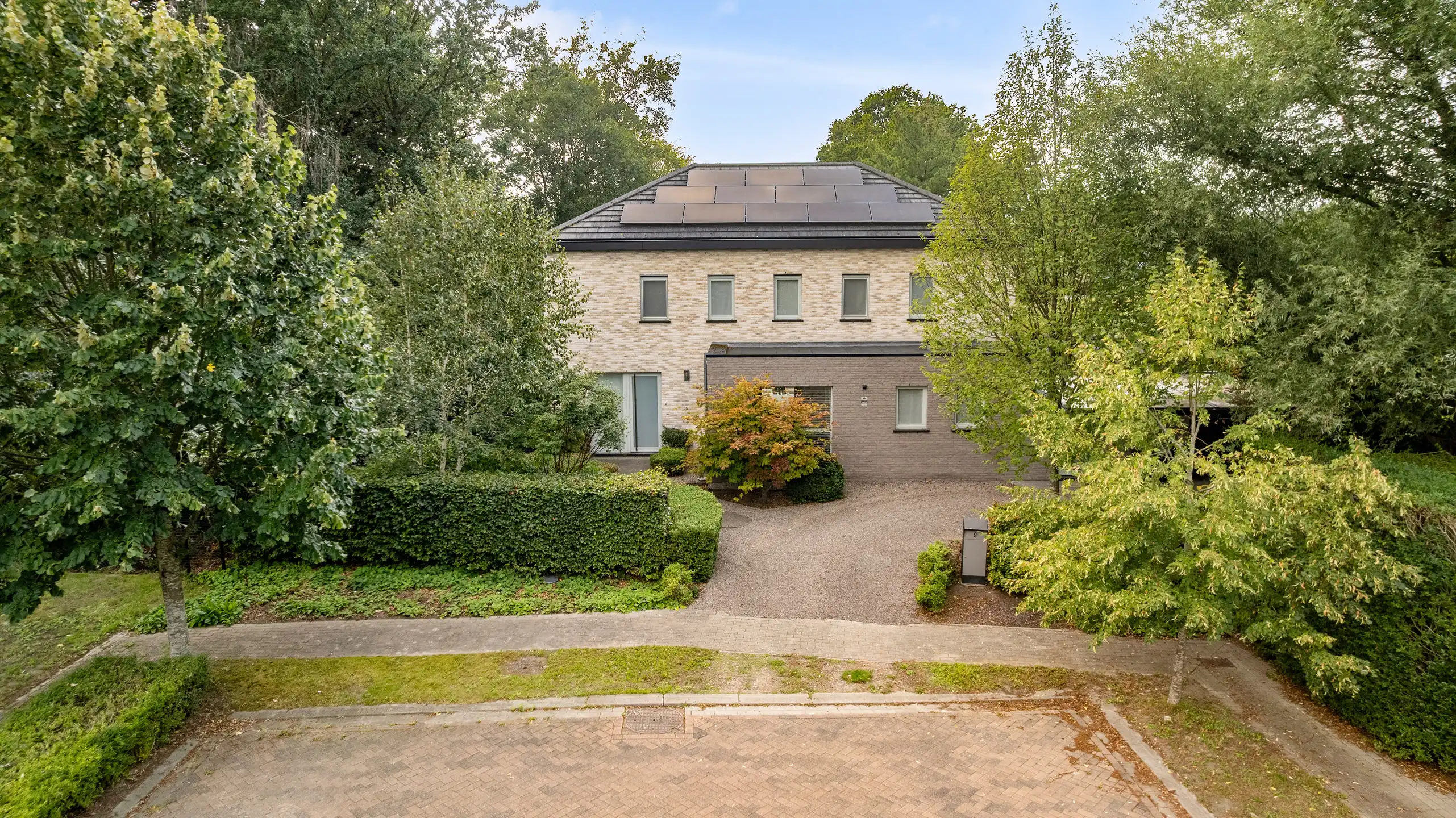 Moderne EPC A-villa op toplocatie nabij scholen en station, met prachtige tuin en privacy foto 48