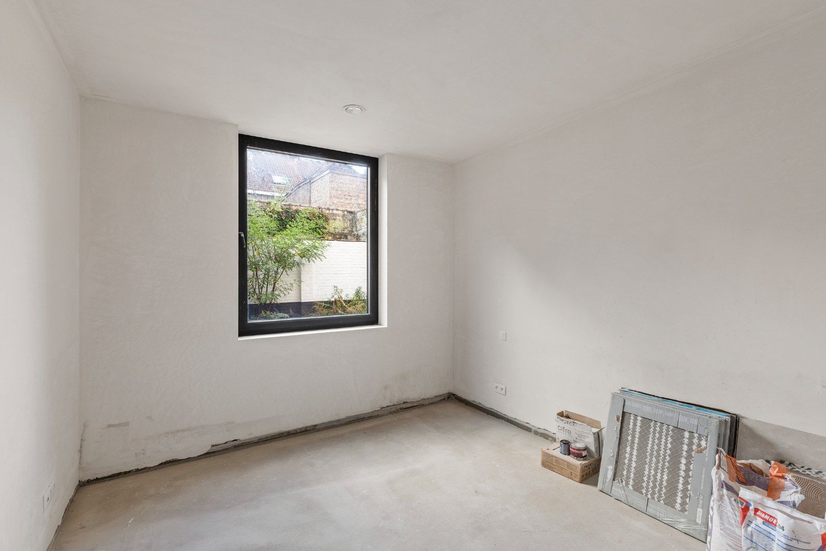 af te werken kangoeroewoning met binnentuin binnen de Brugse Reien foto 29