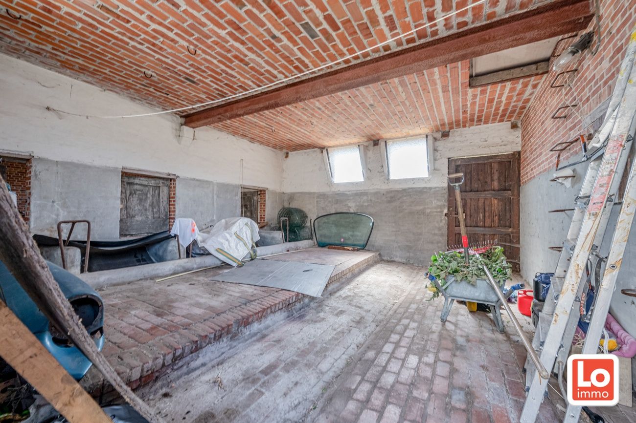 Statige open woning met ruim bijgebouw op groot perceel grond in het centrum van Kalken! foto 26