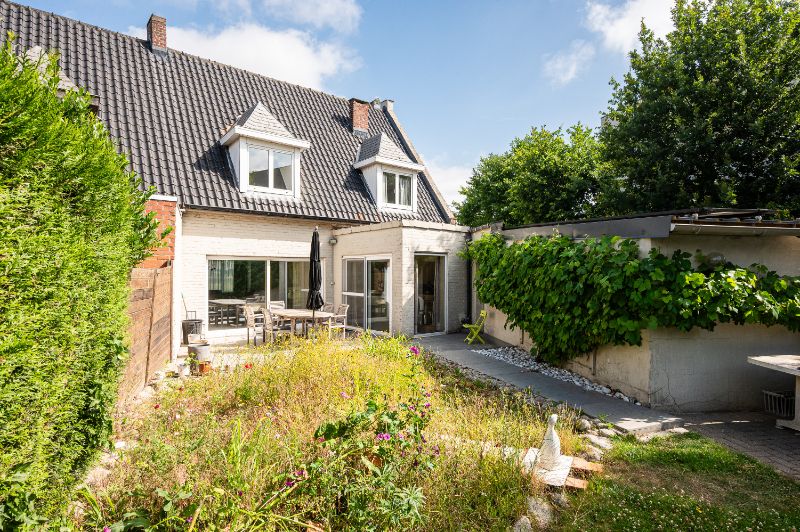 Goed onderhouden woning met zonnig terras en leuke tuin foto 2