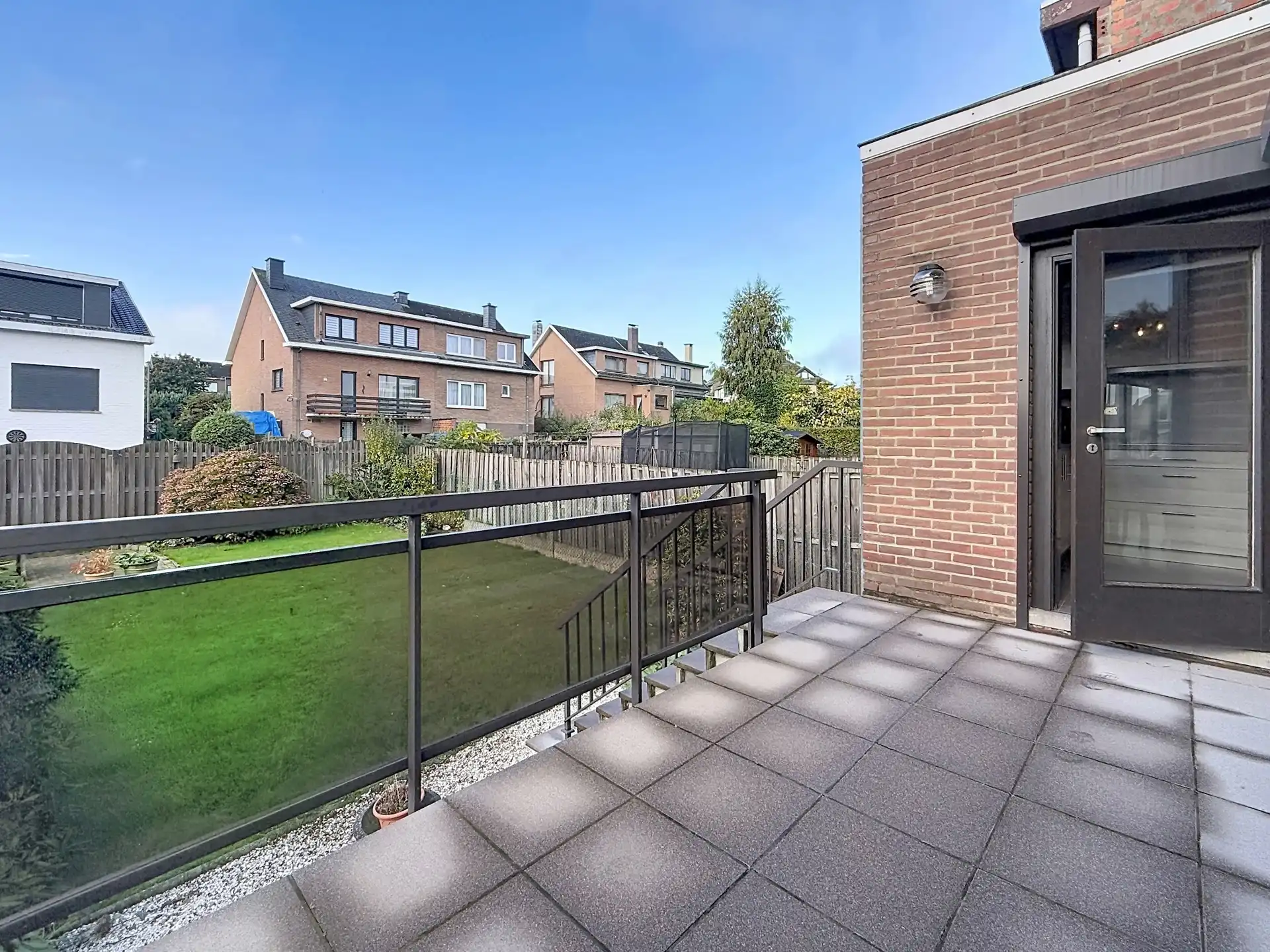 Ruime bel-etagewoning met 3 slaapkamers, dubbele garage en zonnige tuin in Dilbeek! foto 5