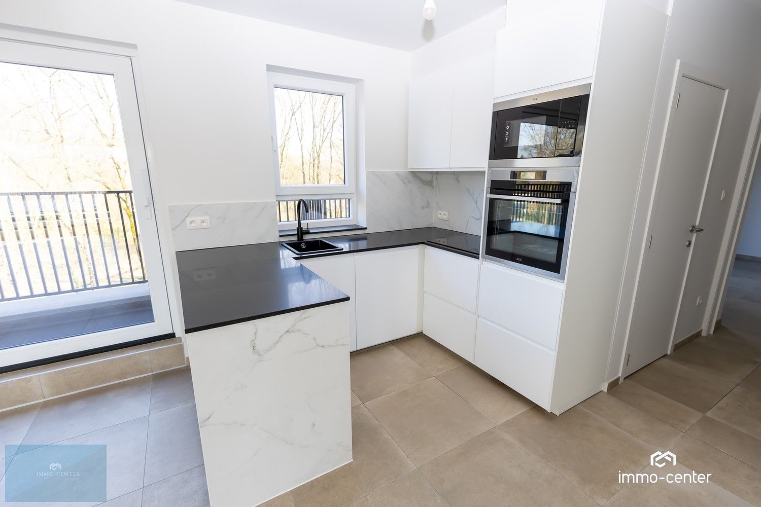 Penthouse met 2 slaapkamers en terras aan voor en achterzijde foto 9