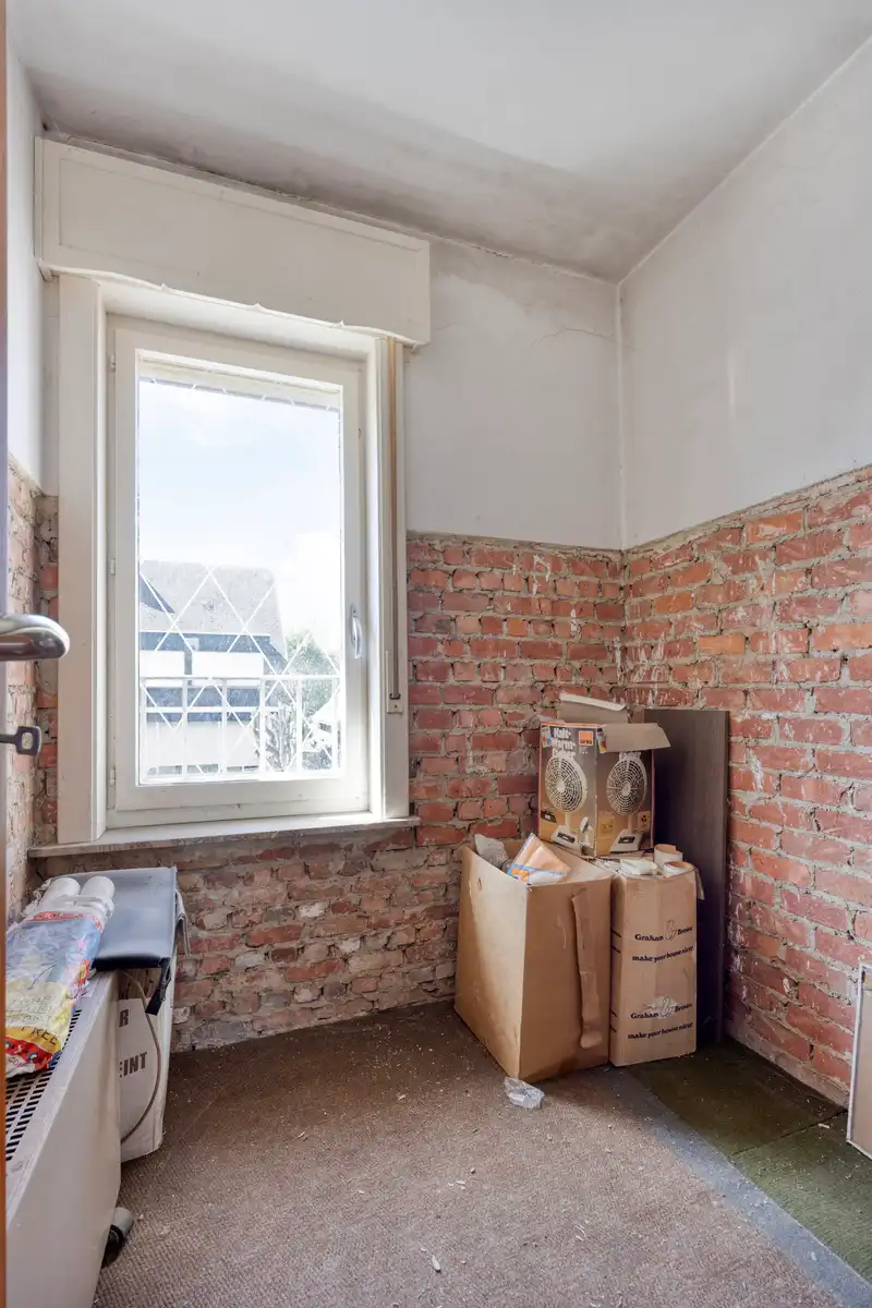 IN OPTIE - Solide te renoveren burgerwoning mét doorgang in Opstal foto 20