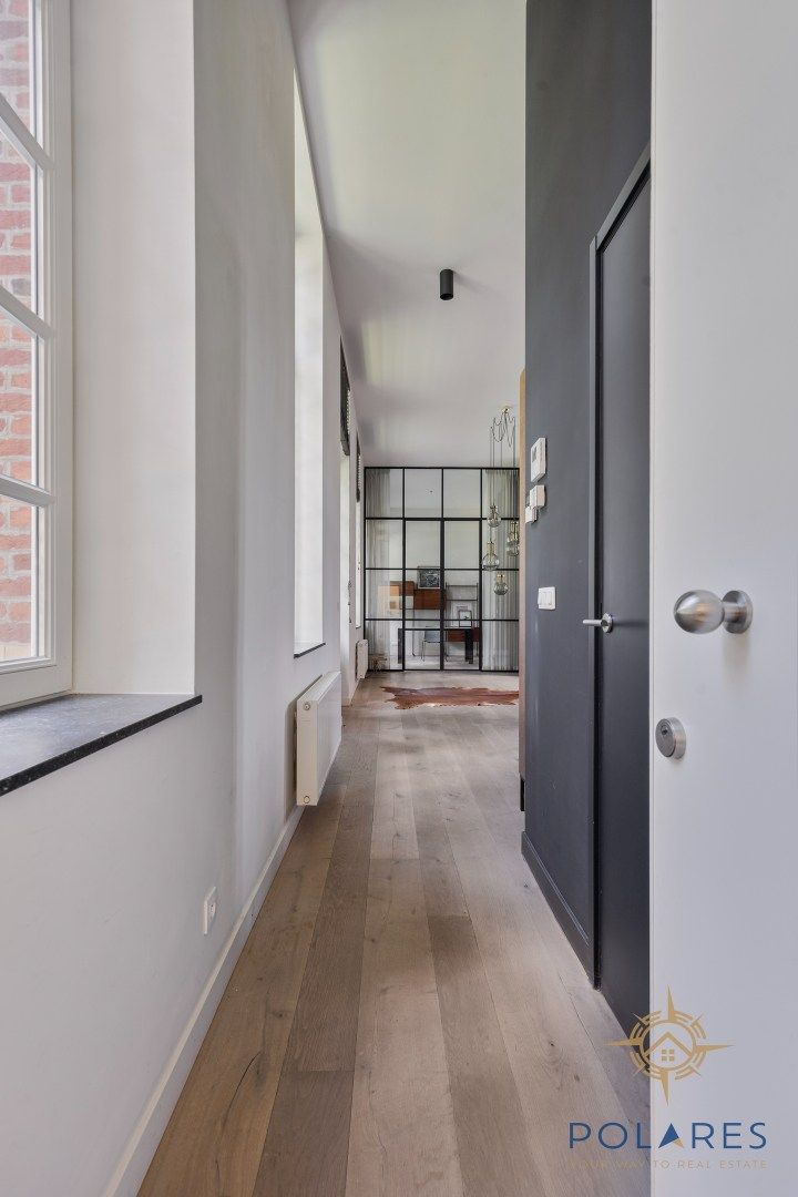 Gelijkvloers 2 slaapkamer appartement met tuin en unieke erfgoedwaarde foto 2