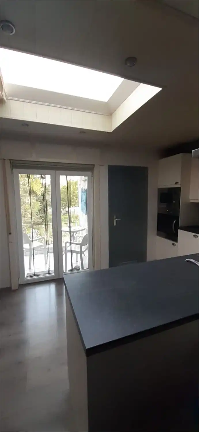 Ruime, praktische woning met tuin foto 17