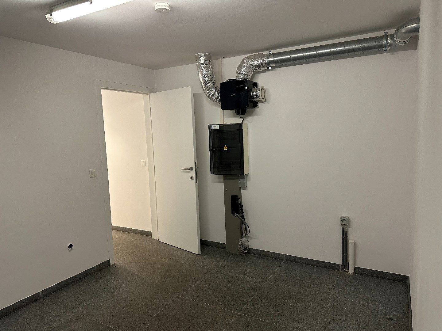 Gelijkvloers appartement met 3 slaapkamers, garage en binnentuintje foto 12